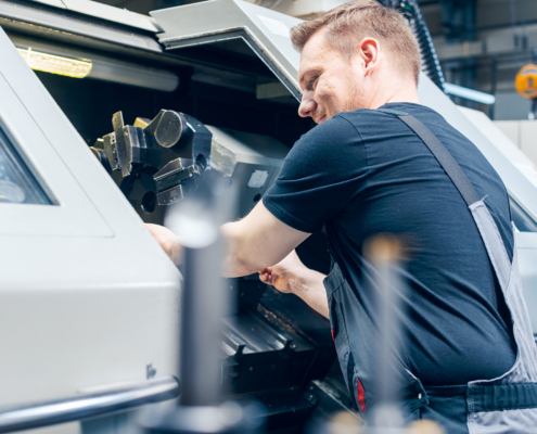 Working Setting Up Cnc Machine For Parts